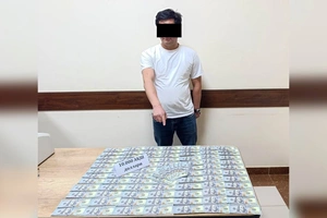 Qibrayda hokim yordamchisi $10 ming bilan ushlandi