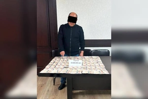 Bo‘kada soliqchi 10 mln so‘m olayotganda ushlandi