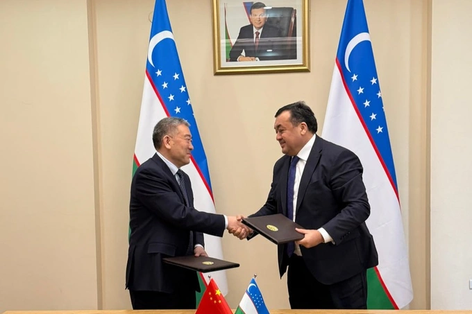 Ильзат Касымов (справа) и Ма Цзайшень