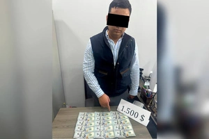 Qurilish vazirligi bosh mutaxassisi $1500 bilan ushlandi