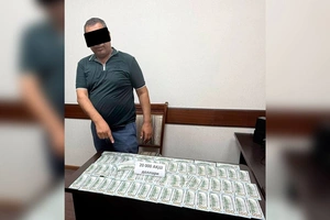 Toshkentda 1,5 gektar yer evaziga $750 ming talab qilgan fuqaro ushlandi